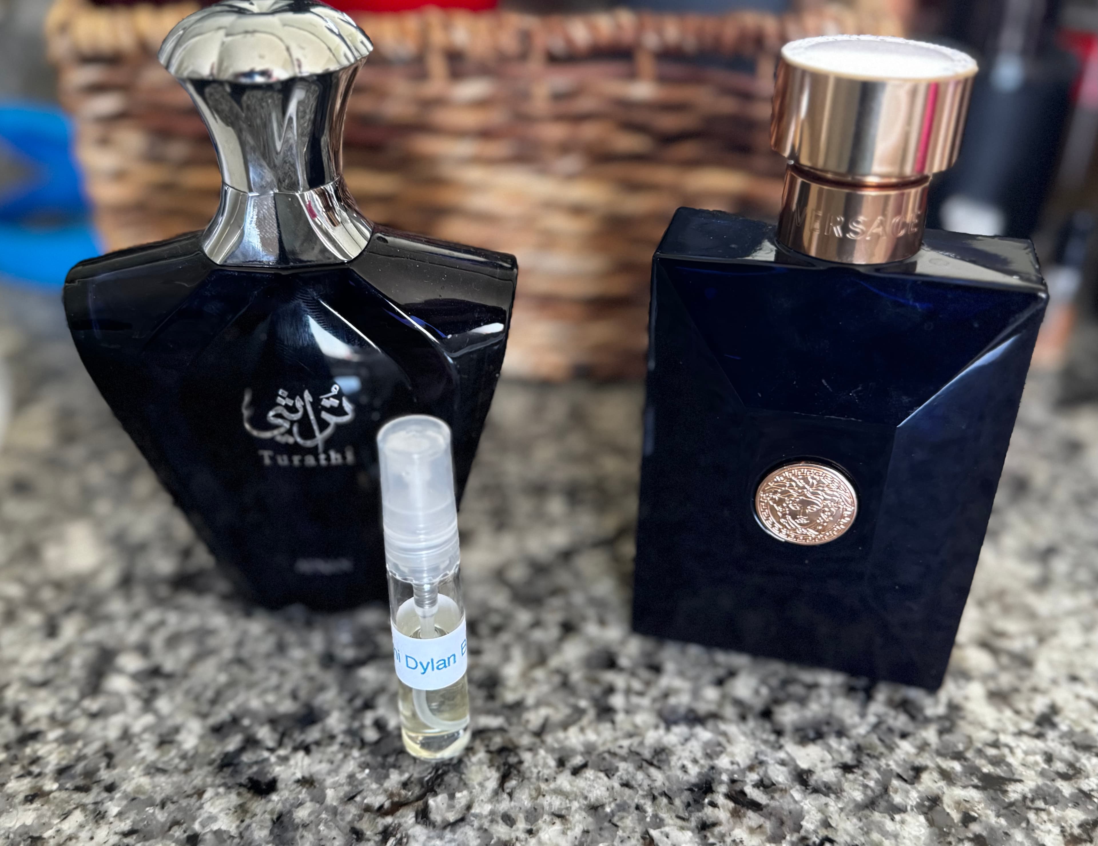 Versace Dylan Blue and Afnan Turathi Blue bottles with a pre-blended decant